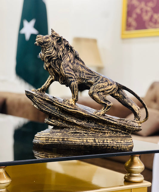 The Roar of Royalty – Golden Lion Sculpture on Cliff Muzamil Decor